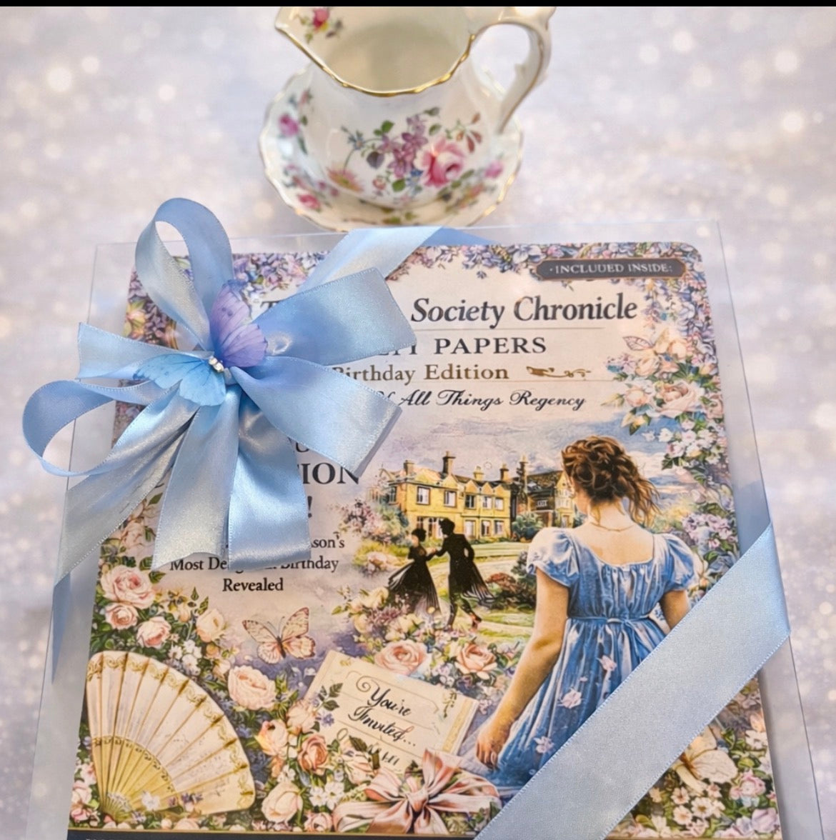 Luxury Regency inspired spa gift box with blue ribbon and romantic vintage illustration, elegant self care gift for her