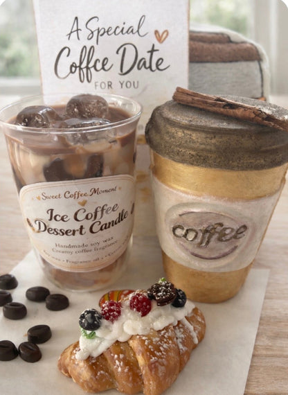 Ice coffee dessert candle, coffee-themed cup, and pastry on a marble surface with a 'Special Coffee Date' card.