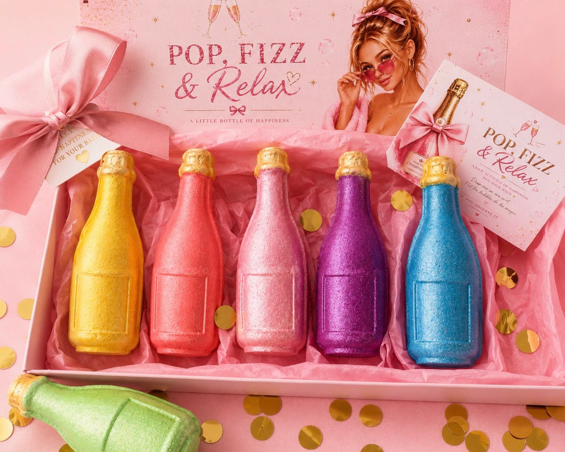 Set of colorful glittery bottles bath bombs in a gift box with 'Pop, Fizz & Relax' text and a woman in a robe.