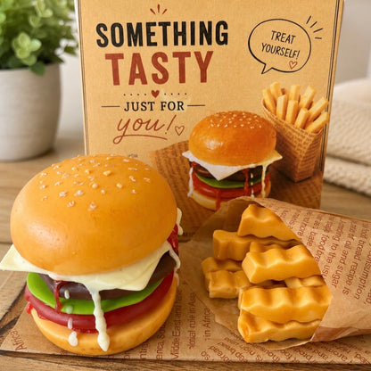 Realistic handmade cheeseburger soap gift set with fries soap pieces in decorative gift packaging. Novelty food-inspired soap for unique birthday and self-care gifts.