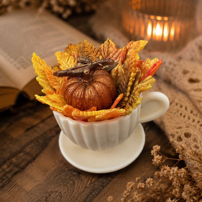 Handmade autumn teacup soap featuring a pumpkin, colourful fall leaves and woodland-inspired details. Cozy seasonal soap gift for autumn lovers, Thanksgiving and home spa.